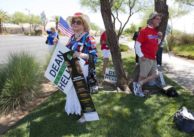 Nelly Segal, left, rallies with other Republicans outside Palo Verde High School before a visit by Republican vice presidential candidate Paul Ryan at the school Tuesday, Aug. 14, 2012. Berkley is running for U.S. Senate against Sen. Dean Heller (R-NV).