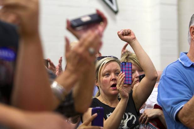 A supporter cheers Republican vice presidential candidate Paul Ryan at a rally at Palo Verde High School in Summerlin Tuesday, Aug. 14, 2012.