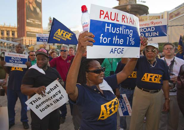 Union members picket against Republican vice presidential candidate Paul Ryan in front of the Venetian on the Las Vegas Strip Tuesday, Aug. 14, 2012. Ryan was reportedly meeting privately with a small group of supporters at the casino owned by Sheldon Adelson, a billionaire and major donor to Republican campaigns.