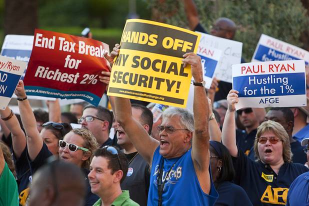 Union members picket against Republican vice presidential candidate Paul Ryan in front of the Venetian on the Las Vegas Strip Tuesday, Aug. 14, 2012. Ryan was reportedly meeting privately with a small group of supporters at the casino owned by Sheldon Adelson, a billionaire and major donor to Republican campaigns.