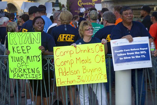 Union members picket against Republican vice presidential candidate Paul Ryan in front of the Venetian on the Las Vegas Strip Tuesday, Aug. 14, 2012. Ryan was reportedly meeting privately with a small group of supporters at the casino owned by Sheldon Adelson, a billionaire and major donor to Republican campaigns.