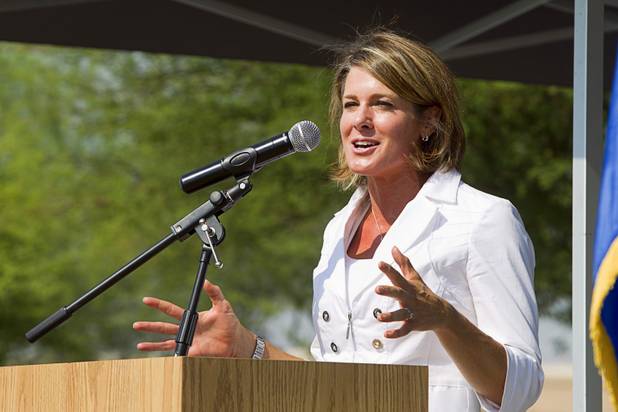 Tina Quigley, general manager of the Regional Transportation Commission, speaks during a ceremony to celebrate the "grand opening" of the I-15 South Design-Build Project in the Town Square parking lot Wednesday, Aug. 15, 2012. Construction on  $246 million improvement project started in Spring 2010.