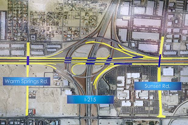 An aerial map shows some of the I-15 improvements during a "grand opening" of the I-15 South Design-Build Project in the Town Square parking lot Wednesday, Aug. 15, 2012. Construction on  $246 million improvement project started in Spring 2010. Yellow lines indicate new pavement,  blue lines are new structures and orange lines show extended express lanes.