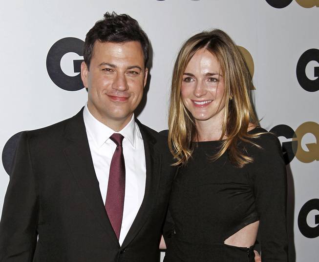 Jimmy Kimmel and Molly McNearney arrive at the GQ Men of the Year party Thursday, Nov. 17, 2011, in Los Angeles.