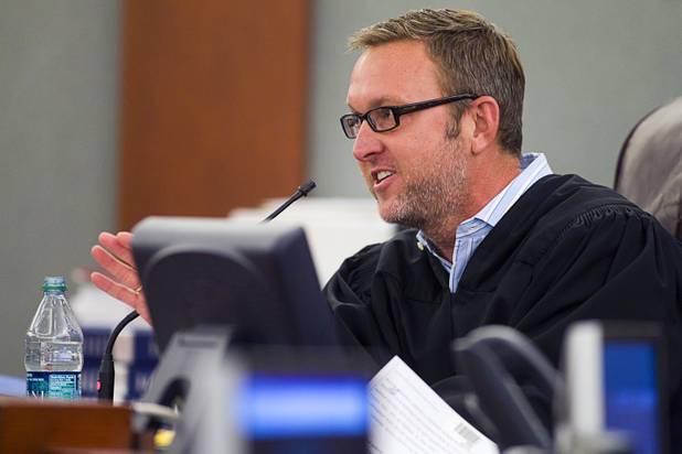 Judge Eric Goodman responds to a motion by Special Public Defender Alzora Jackson, attorney for Nathaniel Burkett, at the Regional Justice Center Thursday, Aug. 16, 2012.  Burkett is suspected of killing two Las Vegas women. A preliminary hearing was set for Oct. 5.