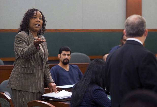 Special Public Defender Alzora Jackson, attorney for Nathaniel Burkett, gestures toward Chief Deputy District Attorney Marc DiGiacomo in court at the Regional Justice Center Thursday, Aug. 16, 2012.  Burkett is suspected of killing two Las Vegas women. A preliminary hearing was set for Oct. 5.