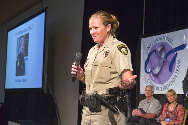 Metro Police Officer Booke Lavin speaks after being named Crisis Intervention Team (CIT) Officer of the Year during a CIT International awards luncheon at the South Point Tuesday, Aug. 21, 2012.  Lavin was honored with the award after calming a suicidal man and then following up to make sure the man received a variety of social services.