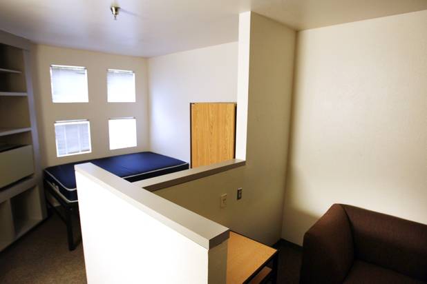 A room inside Hughes Hall, part of the Upper Class ...