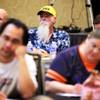 Participants listen during a panel discussion on college football during LVH Supercontest Weekend in Las Vegas on Friday, Aug. 24, 2012.