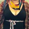 In this spring 2012 photo provided by a woman identified as Avital and made available to the blog Jezebel, Avital poses for a picture at McCarran International Airport in Las Vegas, showing what she was wearing after she says a Southwest Airlines gate agent approached her, alleging that she was showing too much cleavage.
