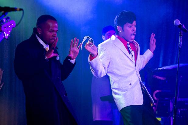 Thomas Austin (impersonating  Jerome Benton) and Drew James (as Morris Day) perform in The D showroom in downtown Las Vegas Sunday, Aug. 26, 2012. Benton and Day were members of The Time, one of the most famous of the Prince associated bands. The band released four albums between 1981 and 1990, with Prince writing and performing most of the instrumentation and backing vocals, with lead vocals by Morris Day.