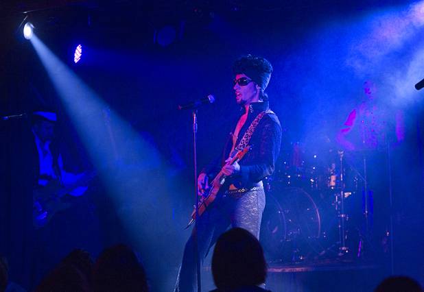 Prince impersonator Jason Tenner performs in The D showroom in downtown Las Vegas Sunday, Aug. 26, 2012.