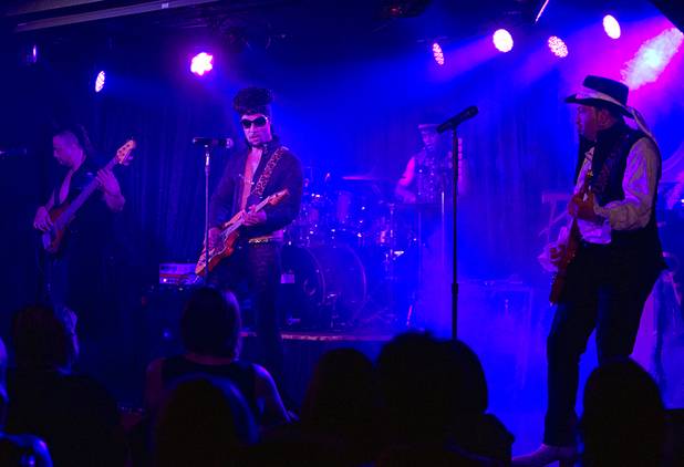 Prince impersonator Jason Tenner performs in The D showroom in downtown Las Vegas Sunday, Aug. 26, 2012.