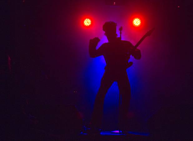 Prince impersonator Jason Tenner performs in The D showroom in downtown Las Vegas Sunday, Aug. 26, 2012.