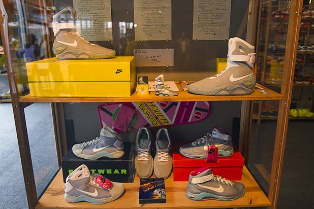 Nike shoes are displayed during the grand opening of the ...