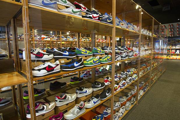 Nike shoes are displayed during the grand opening of the ...