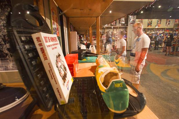 Paul Sanicky of Cleveland looks over a display during the ...