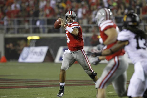 UNLV quarterback Nick Sherry passes the ball during UNLV's season opener against Minnesota at Sam Boyd Stadium Thursday, Aug. 30, 2012. 
