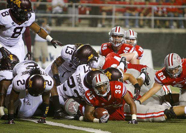 UNLV's Tim Cornett comes up short of the goal line in regulation play during UNLV's season opener against Minnesota at Sam Boyd Stadium Thursday, Aug. 30, 2012.