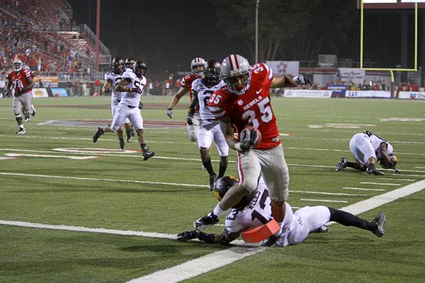 UNLV's Tim Cornett scores in the first overtime period during UNLV's season opener against Minnesota at Sam Boyd Stadium Thursday, Aug. 30, 2012.