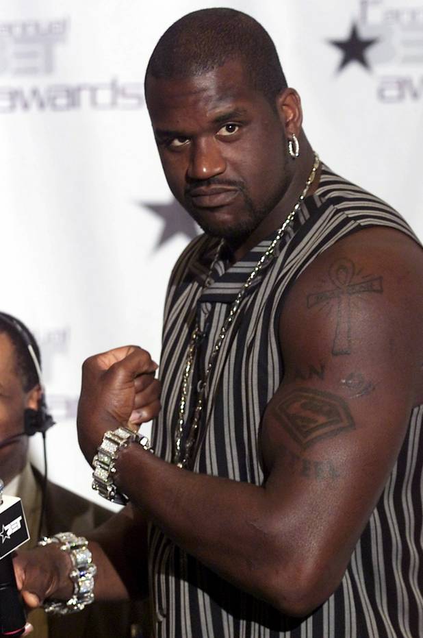 Shaquille O'Neal poses at the first annual BET Awards show in the Paris Las Vegas hotel-casino June 19, 2001.