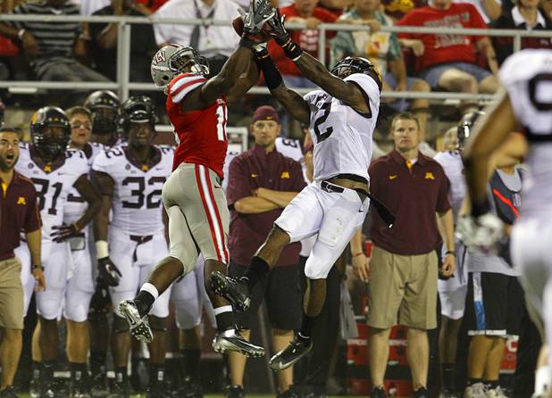 UNLV's Marcus Sullivan and Minnesota's Martez Shabazz jump for a pass during UNLV's season opener against Minnesota at Sam Boyd Stadium Thursday, Aug. 30, 2012. Sullivan made the reception.  