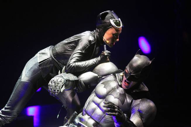 Emma Clifford performs as Catwoman, left, and Sam Heughan performs as Batman during a technical rehearsal for "Batman Live" at the Thomas & Mack Center in Las Vegas on Friday, August 31, 2012. The show will run at the Thomas & Mack Center from October 3-7.