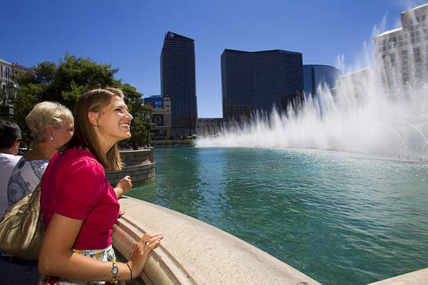 Kaitlyn Ferguson, an intern pastor from Minnesota, watches the fountain show at the Bellagio during a tour Saturday, Sept.1, 2012. Ferguson will to serve as an intern pastor for a year at the New Song Church in Henderson.