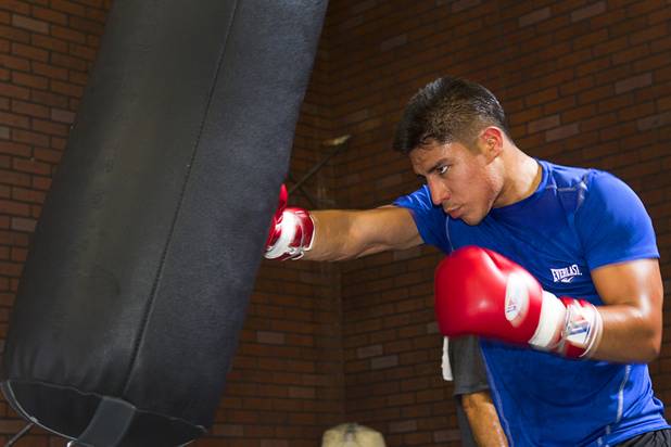 Las Vegan welterweight boxer Jessie Vargas hits a heavy bag during a workout at Top Rank Gym Tuesday Sept. 4, 2012. Vargas will fight Aron Martinez of Los Angeles at the Hard Rock Hotel on Thursday, September 13.