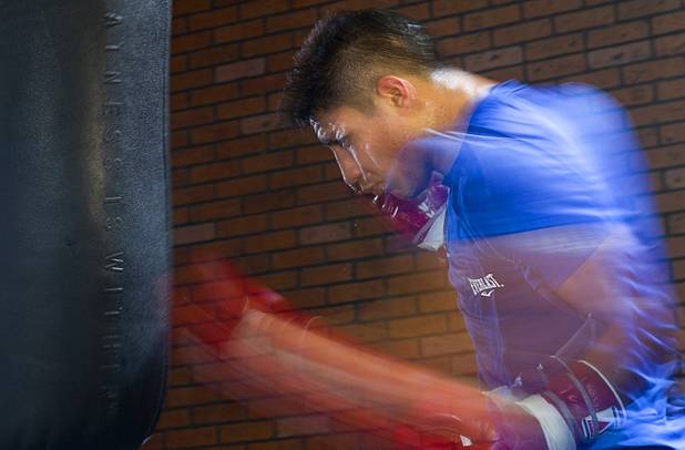 Las Vegan welterweight boxer Jessie Vargas hits a heavy bag during a workout at Top Rank Gym Tuesday Sept. 4, 2012. Vargas will fight Aron Martinez of Los Angeles at the Hard Rock Hotel on Thursday, September 13.