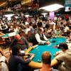 Poker players compete on the first day of the World Series of Poker Main Event Saturday, July 7, 2012, at the Rio in Las Vegas. With Caesars Entertainment stock falling, analysts have suggested the company might spin off the WSOP.