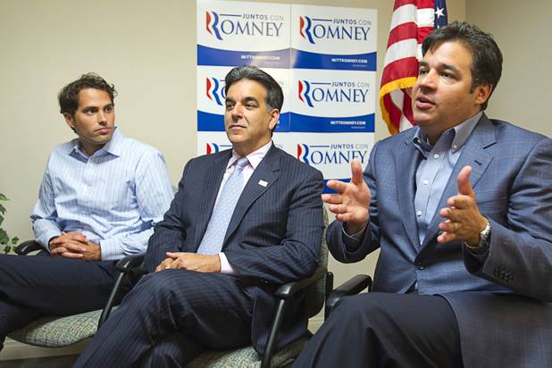Craig Romney, left, the youngest son of GOP presidential candidate Mitt Romney, Hector Barreto, center, former administrator of the U.S. Small Business Administration, and U.S. Congressman Raul Labrador (R-ID) respond to questions from reporters before  a Hispanic small business dialogue at the Greater Las Vegas Association of Realtors offices Wednesday, Sept. 5, 2012.