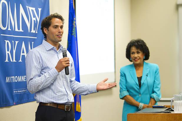 Craig Romney, the youngest son of GOP presidential candidate Mitt Romney, speaks during a Hispanic small business dialogue at the Greater Las Vegas Association of Realtors offices Wednesday, Sept. 5, 2012. Moderator Sandy Peltyn is at right.