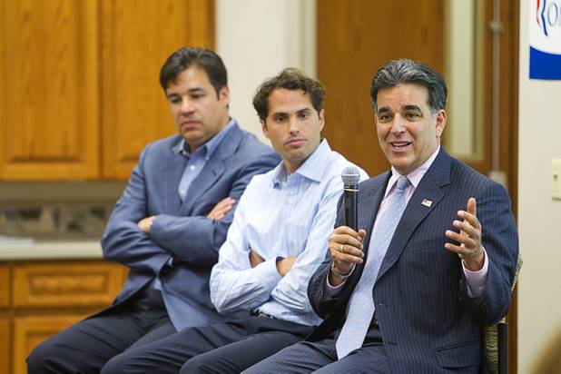 Hector Barreto, right, former administrator of the U.S. Small Business Administration, responds to a question during a Hispanic small business dialogue at the Greater Las Vegas Association of Realtors offices Wednesday, Sept. 5, 2012. With Barreto are U.S. Congressman Raul Labrador, left, (R-ID) and Craig Romney, center, the youngest son of GOP presidential candidate Mitt Romney.