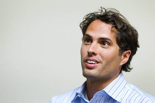 Craig Romney, the youngest son of GOP presidential candidate Mitt Romney, speaks with reporters before a Hispanic small business dialogue at the Greater Las Vegas Association of Realtors offices Wednesday, Sept. 5, 2012.