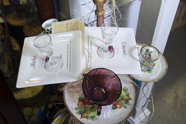 Hand-made bird feeders are displayed at the Artifact boutique in The Market LV portion of Tivoli Village Thursday, Sept. 6, 2012. The shop specializes in recycled, up cycled and re-purposed items.
