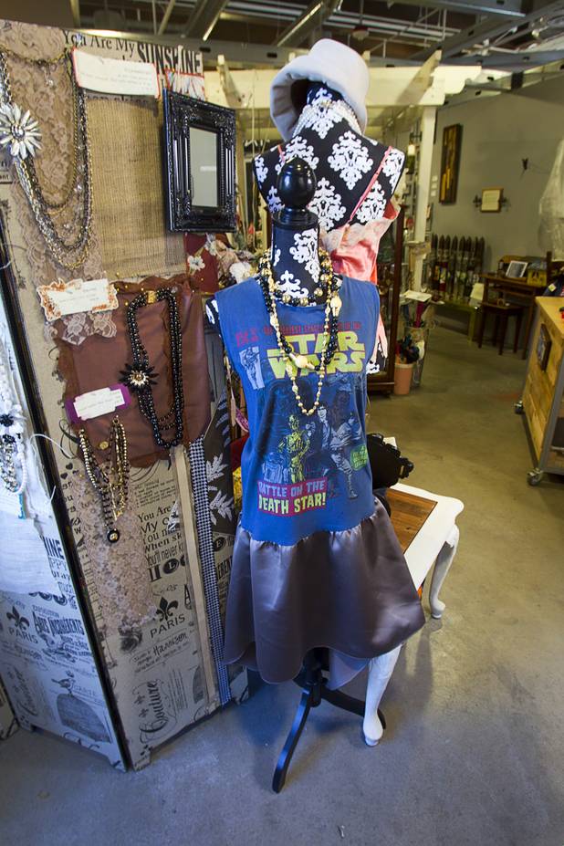 Clothing and jewelry are displayed at the Artifact boutique in The Market LV portion of Tivoli Village Thursday, Sept. 6, 2012. The shop specializes in recycled, up cycled and re-purposed items.