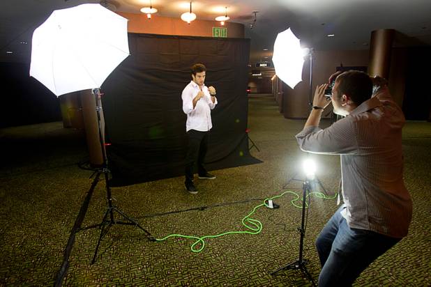 Andrew Kellogg photographs welterweight MMA fighter Gregor Gracie of Brazil following the announcement of the World Series of Fighting league at the Planet Hollywood Live theater (formerly the Theatre for the Performing Arts) at Planet Hollywood Thursday, Sept. 6, 2012. The new league will debut with a fight card broadcast on NBC at the theater on Nov. 3.