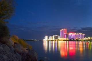 Laughlin casino lights are reflected in the Colorado River at sunset Sunday, Sept. 9. 2012.