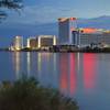 Laughlin casino lights are reflected in the Colorado River at sunset Sunday, Sept. 9. 2012.
