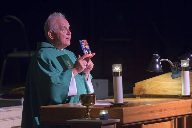 A magic fan, Father Charlie Urnick promotes an upcoming church trip to a Las Vegas magic show during St. John the Baptist Catholic Church Mass at the Riverside Casino in Laughlin Sunday, Sept. 9. 2012. The church is the only Catholic church that holds weekly Mass in a casino, Urnick said.