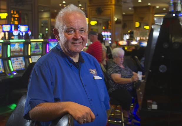 Father Charlie Urnick of St. John the Baptist Catholic Church poses on the casino floor following Mass at the Riverside Casino in Laughlin Sunday, Sept. 9. 2012. The church is the only Catholic church that holds weekly Mass in a casino, Urnick said.