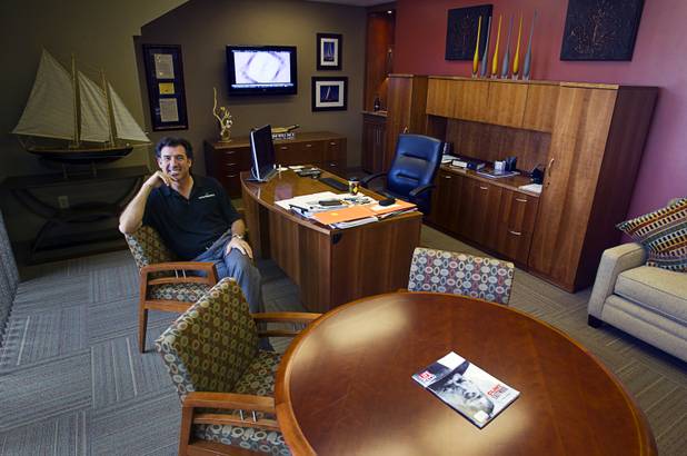 Frank Gatski, CEO, sits in his office at Gatski Commercial Real Estate Services Monday, Sept. 10, 2012. The office recently completed an interior renovation.
