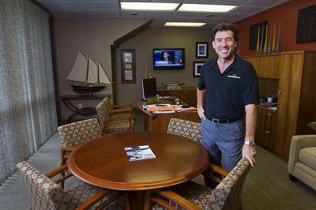 Frank Gatski, CEO, poses in his office at Gatski Commercial Real Estate Services Monday, Sept. 10, 2012. The office recently completed an interior renovation.