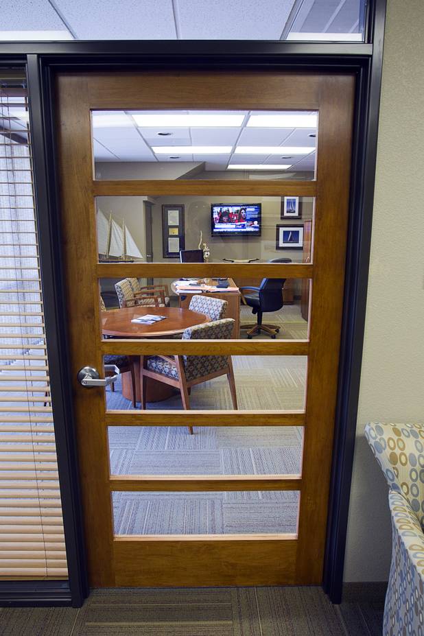 A custom-made door to the CEO's office is shown at Gatski Commercial Real Estate Services Monday, Sept. 10, 2012. The office recently completed an interior renovation.