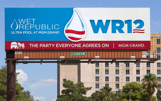 A billboard on Koval Lane advertises the Wet Republic pool party with a presidential campaign theme Monday, Sept. 10, 2012. 