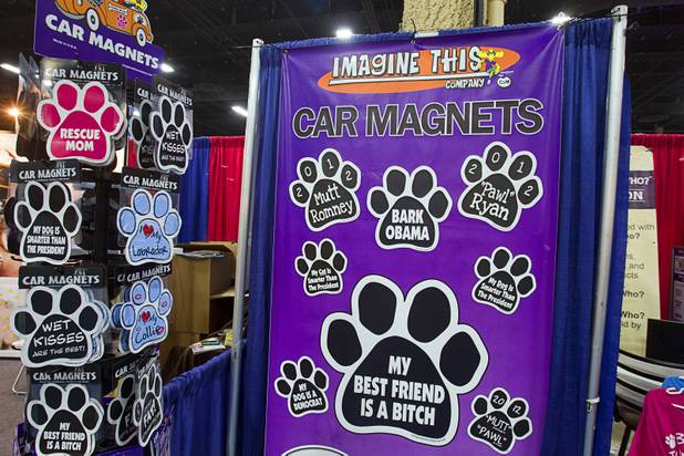 Pet-themed car magnets are displayed during SuperZoo, a trade show for the pet industry, at the Mandalay Bay Convention Center Tuesday, Sept. 11, 2012.