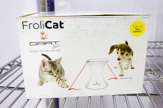 A Dart Duo by FroliCat is displayed during SuperZoo, a trade show for the pet industry, at the Mandalay Bay Convention Center Tuesday, Sept. 11, 2012. The rotating laser light toy has adjustable speeds and timer settings and 16 play combinations.