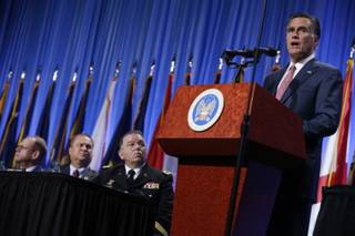Republican presidential candidate, former Massachusetts Gov. Mitt Romney, addresses the National Guard Association Convention in Reno, Nev., Tuesday, Sept. 11, 2012. Third from left is Major General Francis D. Vavala.