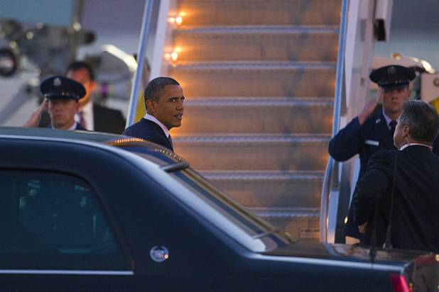President Barack Obama prepares to boards Air Force One to depart McCarran International Airport Wednesday, Sept. 12, 2012.  Obama rallied supporters during a campaign stop at the Cashman Center.